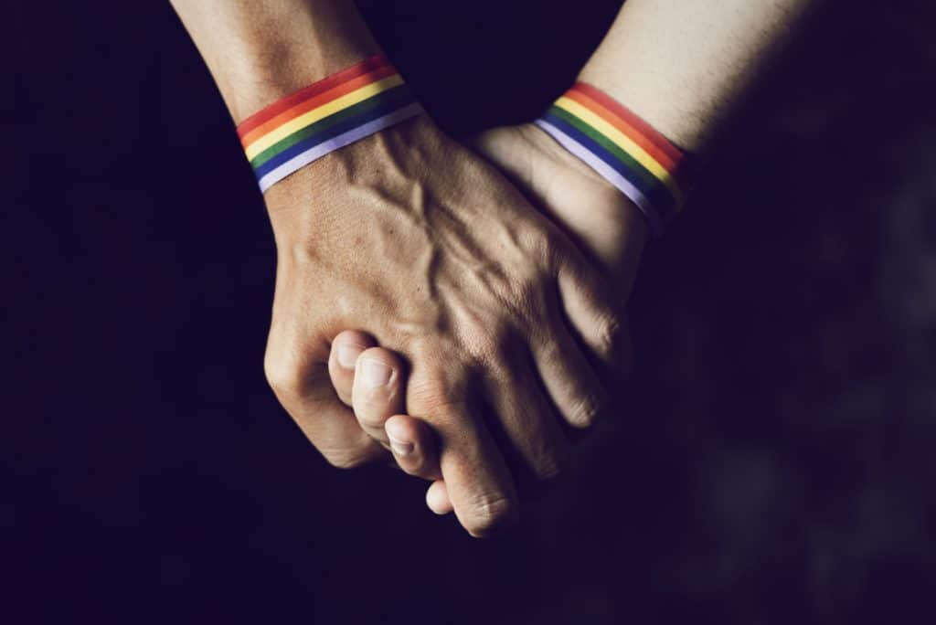 LBGTQ bands on hands